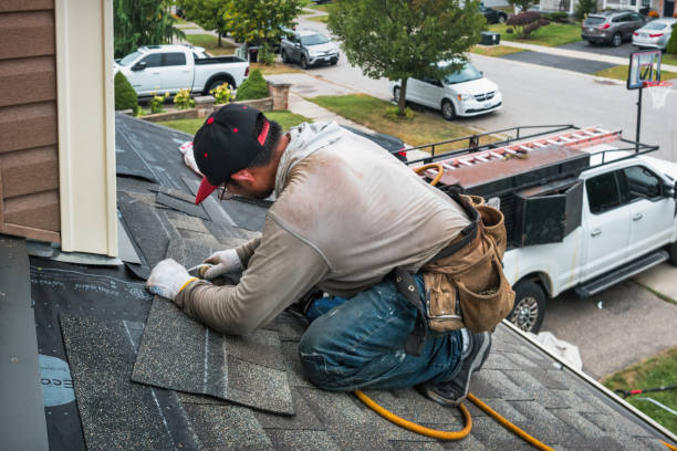 Professional Roofing technician working in Woods Cross Roads, VA